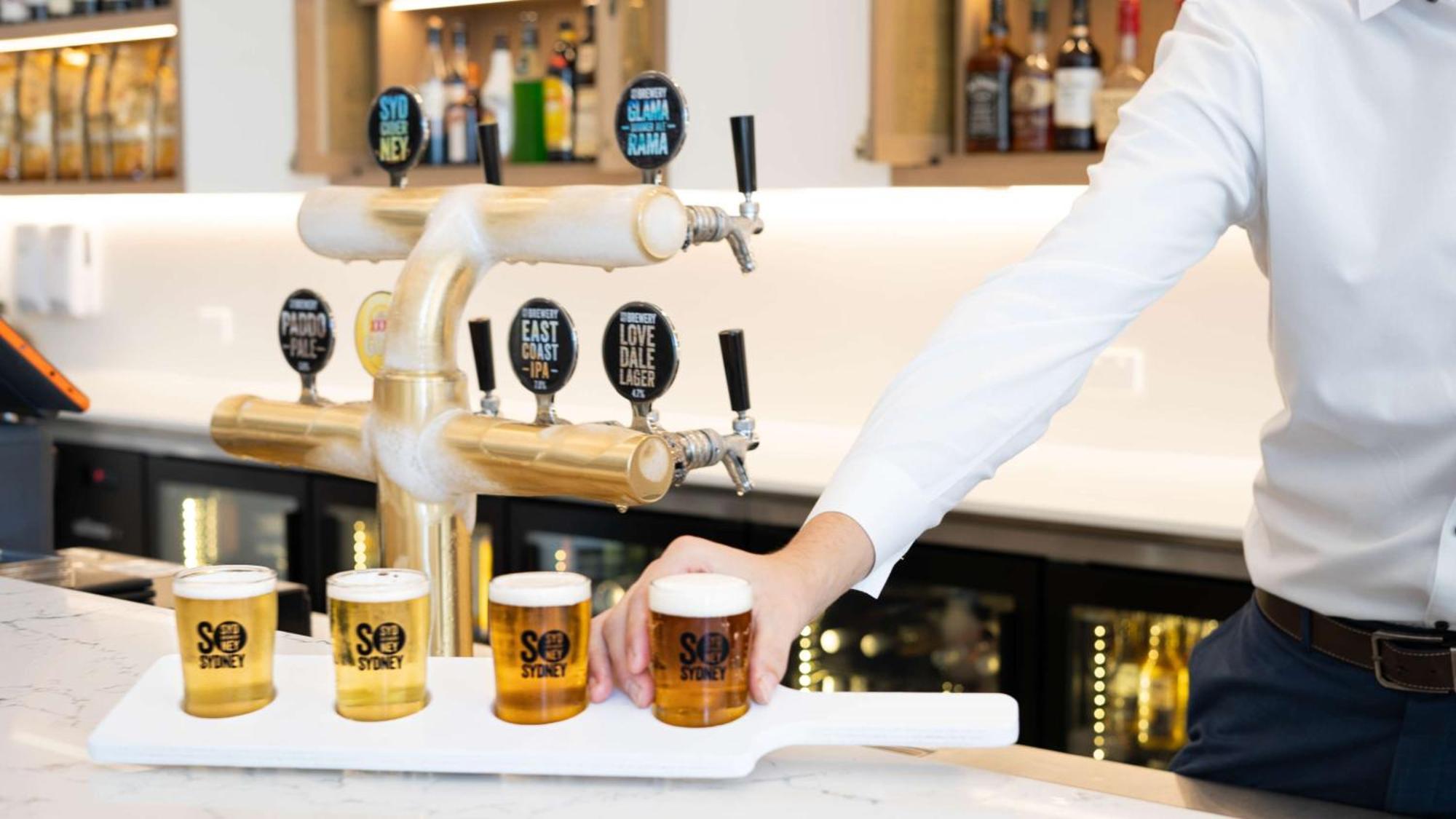 Hilton Surfers Paradise Hotel & Residences Gold Coast Exterior photo Beer taps at a bar